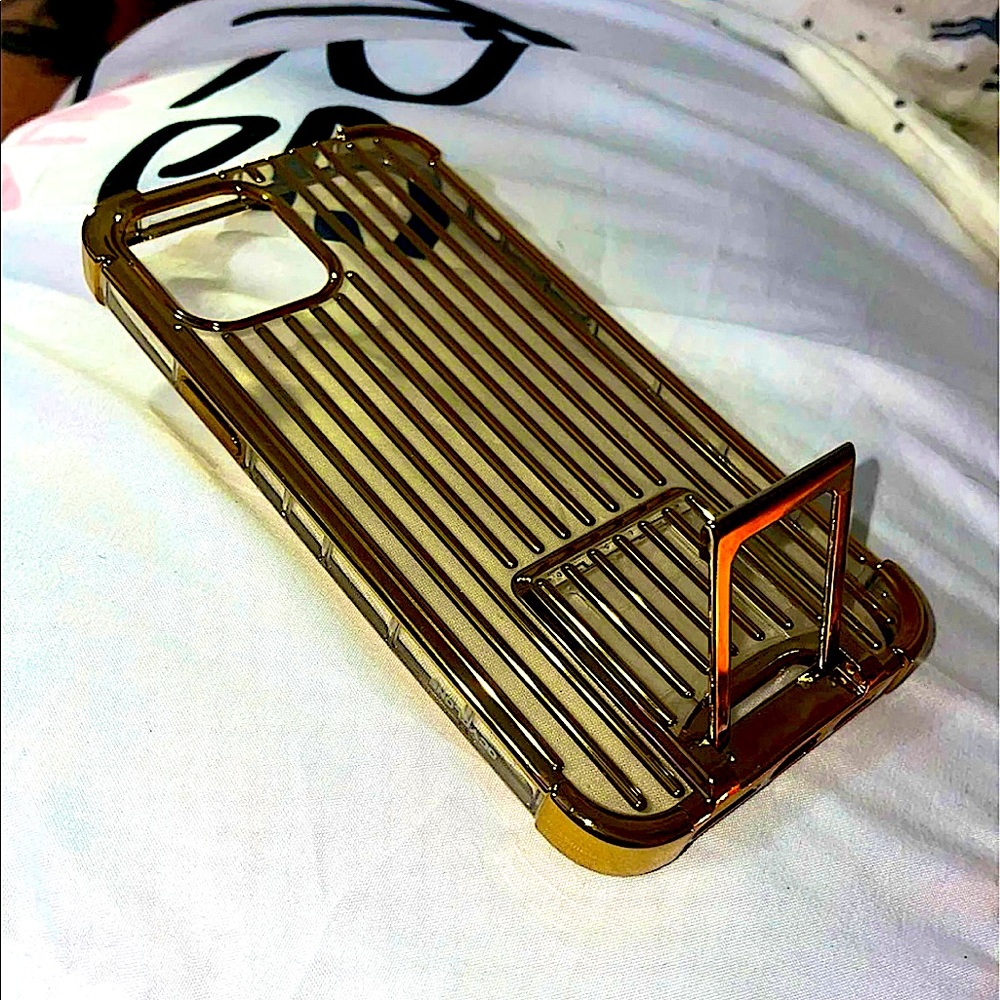 iPhone 12 Pro Gold case with slide out stand on bottom!